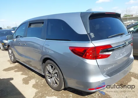 2023 Honda Odyssey Touring z USA, uszkodzony, nr VIN 5FNRL6H89PB000246